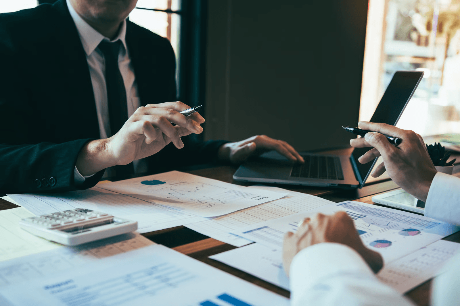 Business owners reviewing equipment finance options with Stryve Finance